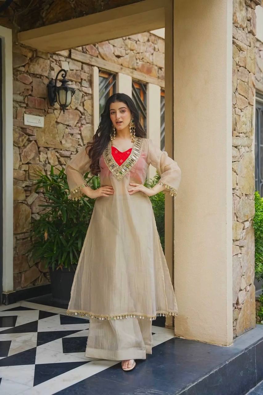 Delightful Cream Colour Salsa Embroidery Mirror Work Suit
