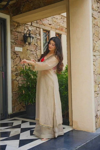 Delightful Cream Colour Salsa Embroidery Mirror Work Suit