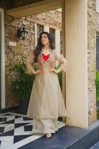 Delightful Cream Colour Salsa Embroidery Mirror Work Suit