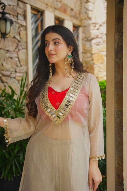 Delightful Cream Colour Salsa Embroidery Mirror Work Suit