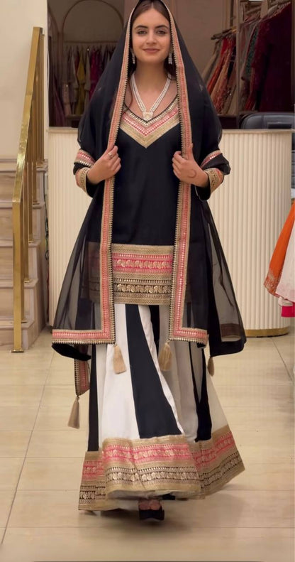 Women's Ethnic Black V-Neck Kurta with Striped Sharara & Tasseled Sheer Dupatta